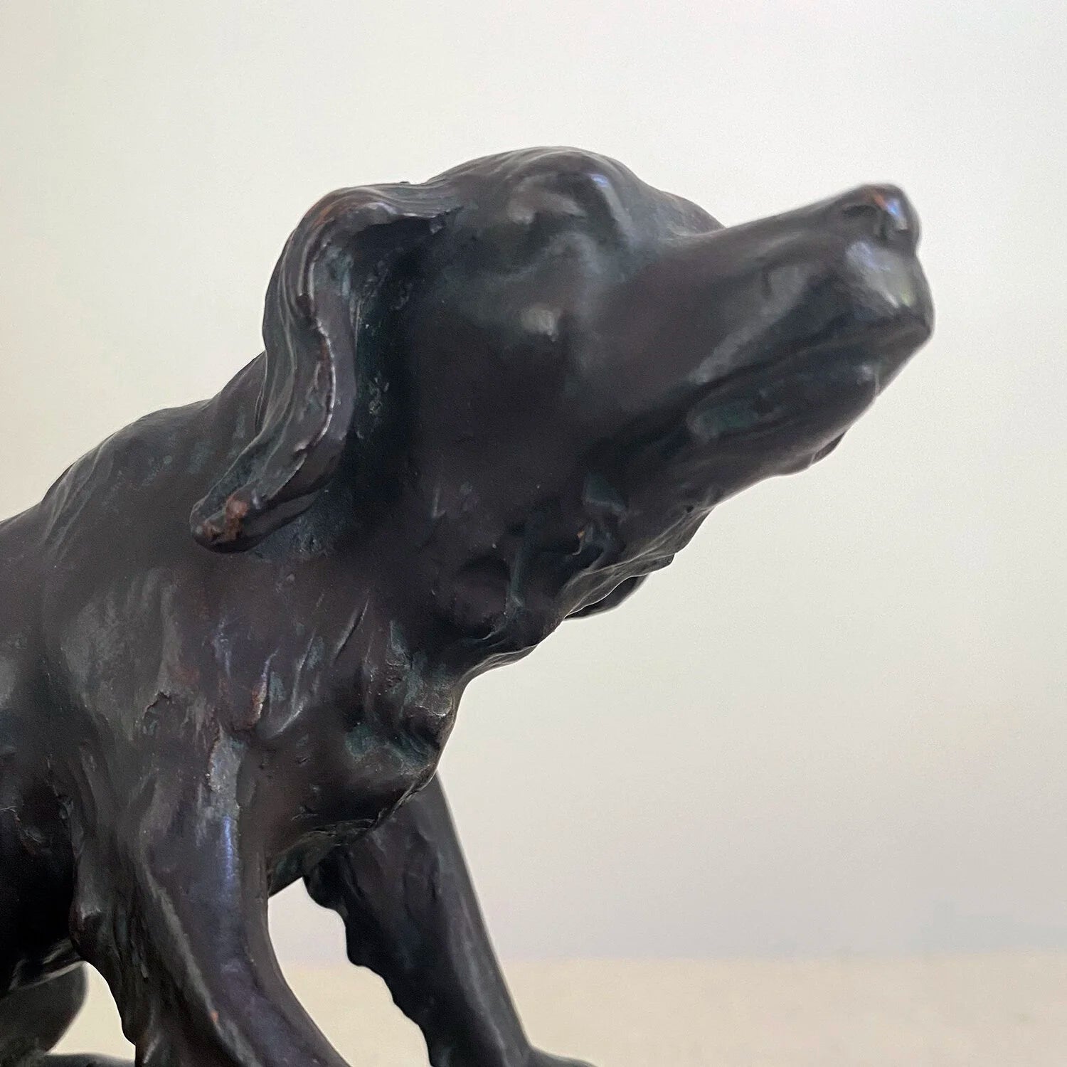 PAINTED TERRACOTTA FIGURE OF A DOG