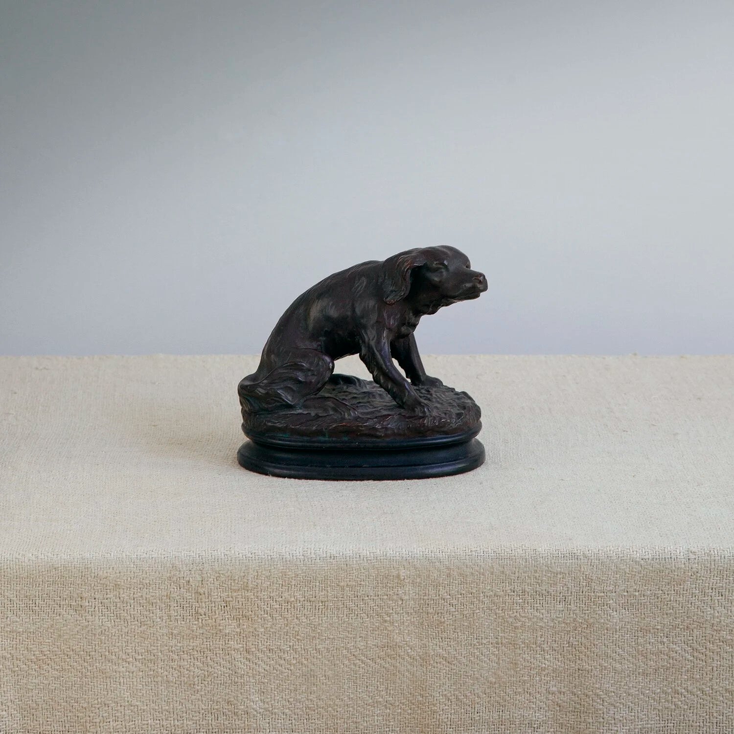 PAINTED TERRACOTTA FIGURE OF A DOG