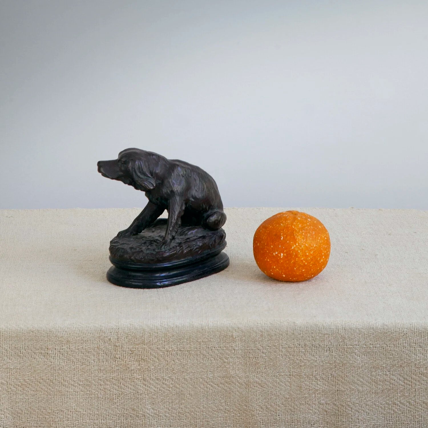 PAINTED TERRACOTTA FIGURE OF A DOG