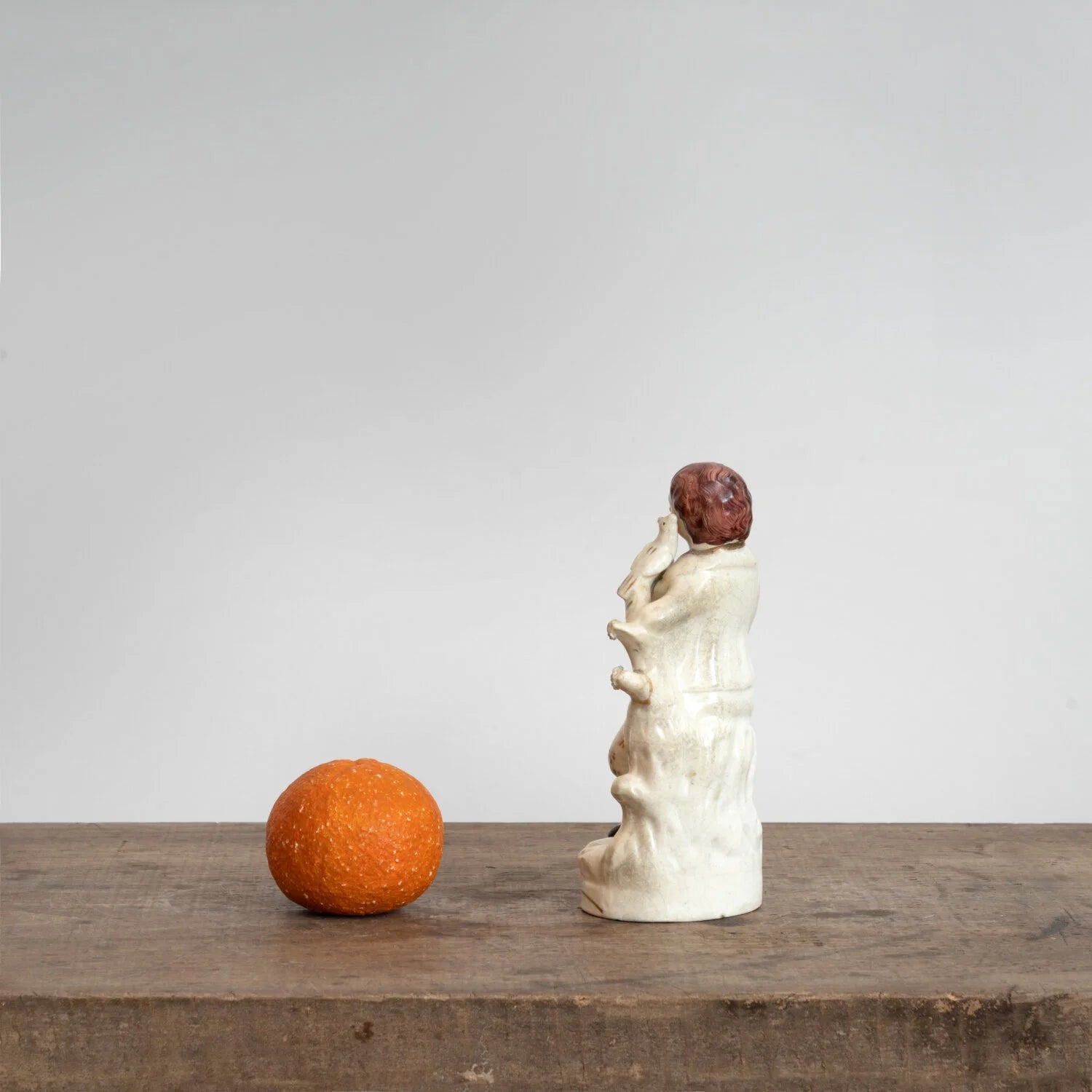 STAFFORDSHIRE FIGURINE OF A BOY WITH BIRD