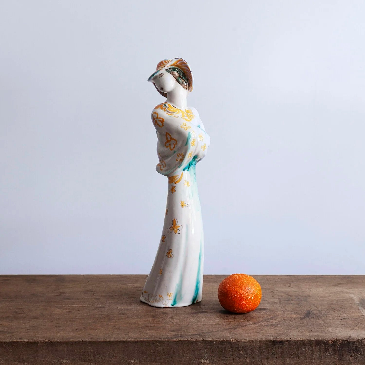 TERRACOTTA FIGURE OF A WOMAN