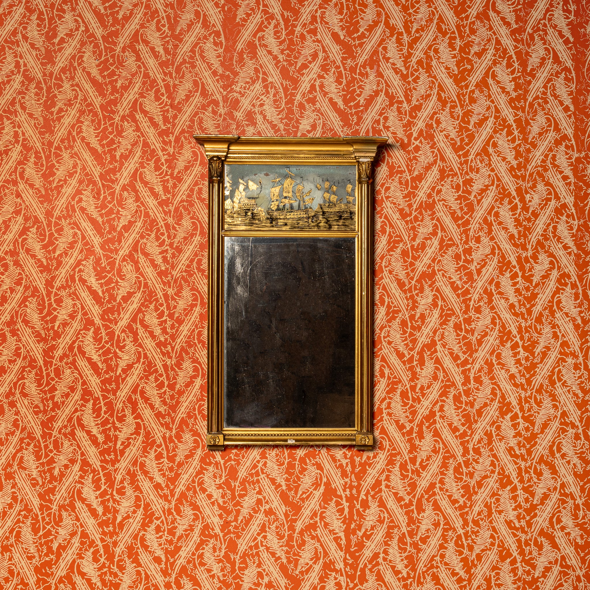 Reverse-painted ship’s mirror, 19th century giltwood