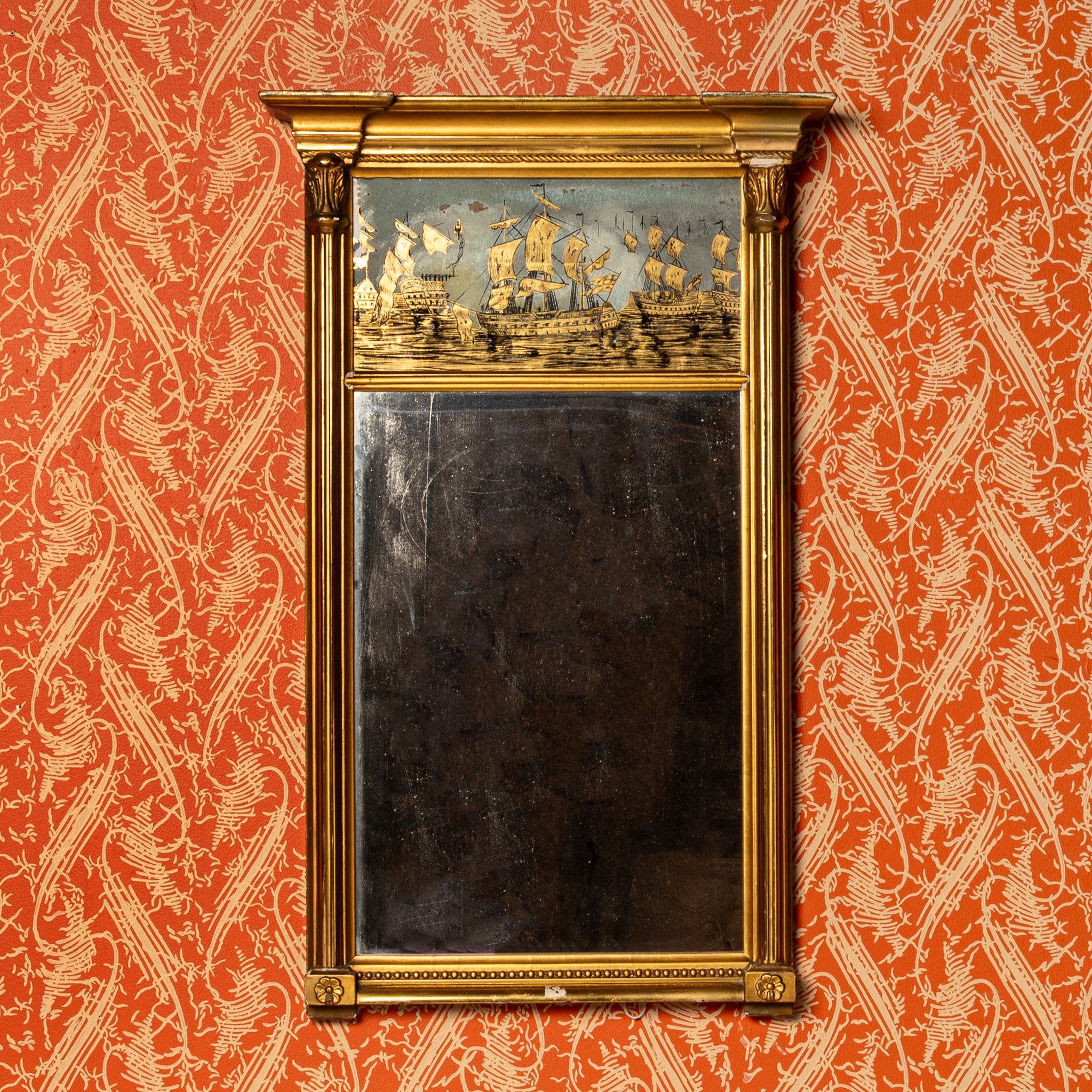 Reverse-painted ship’s mirror, 19th century giltwood