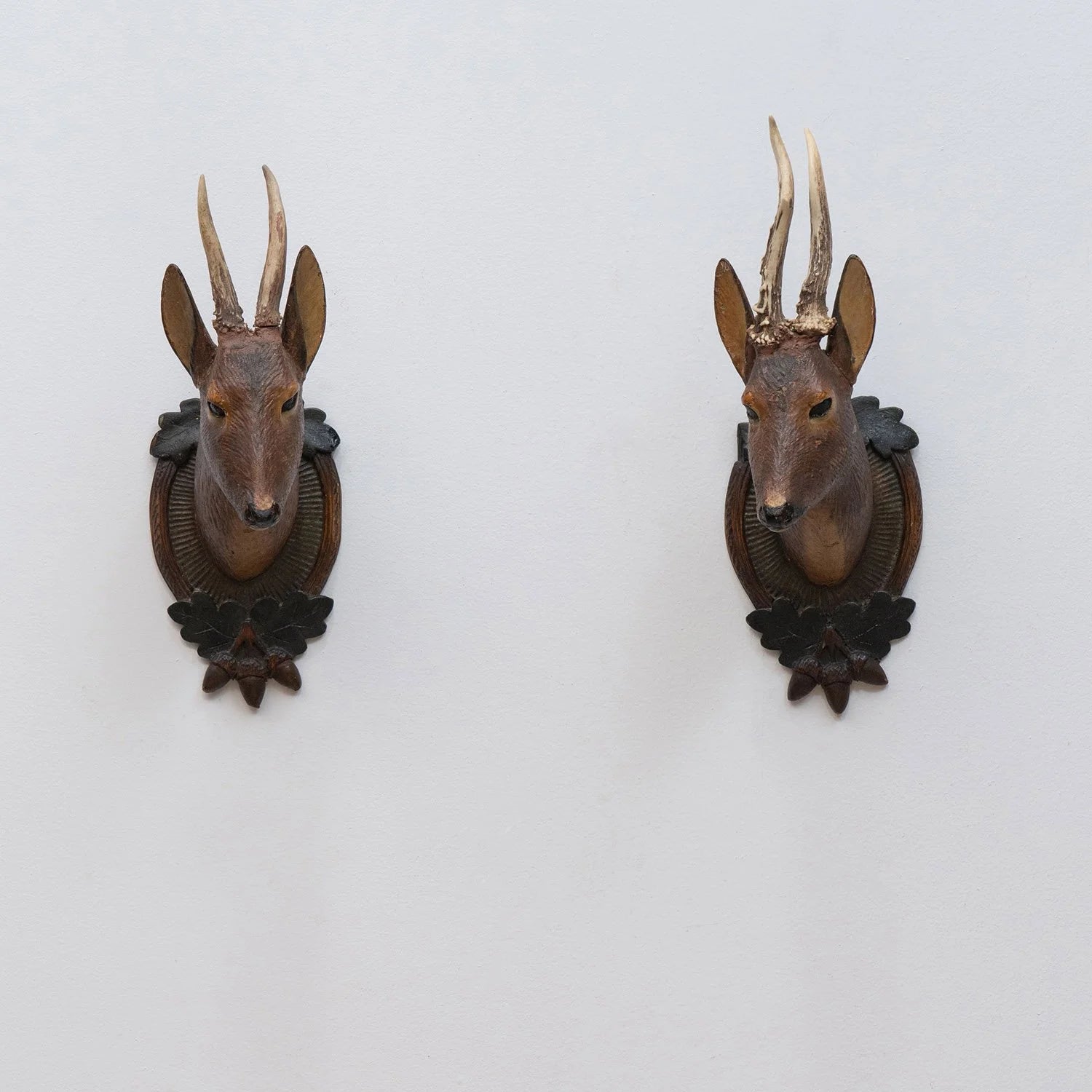 PAIR OF BLACK FOREST CARVED DEER HEAD