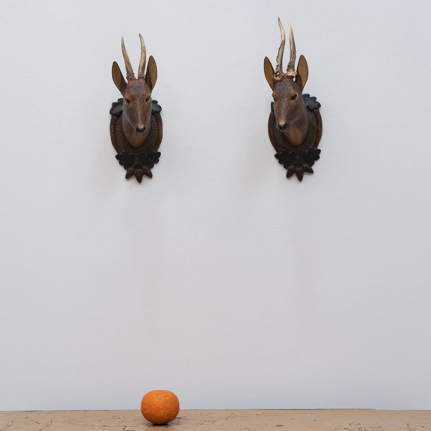 PAIR OF BLACK FOREST CARVED DEER HEAD