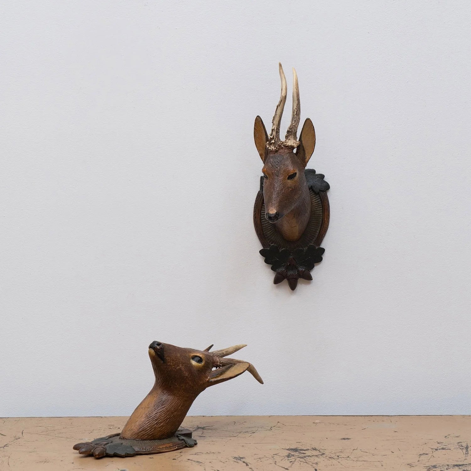 PAIR OF BLACK FOREST CARVED DEER HEAD