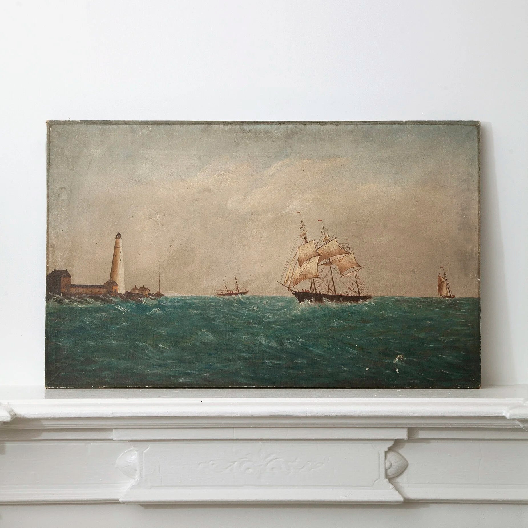 SEASCAPE WITH LIGHTHOUSE AND SHIPS