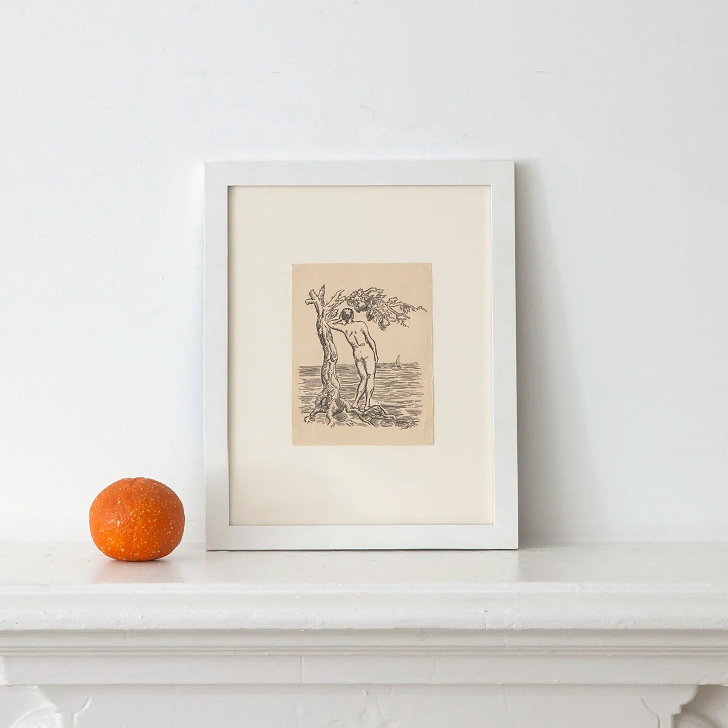 NUDE YOUNG MAN BY THE SEA