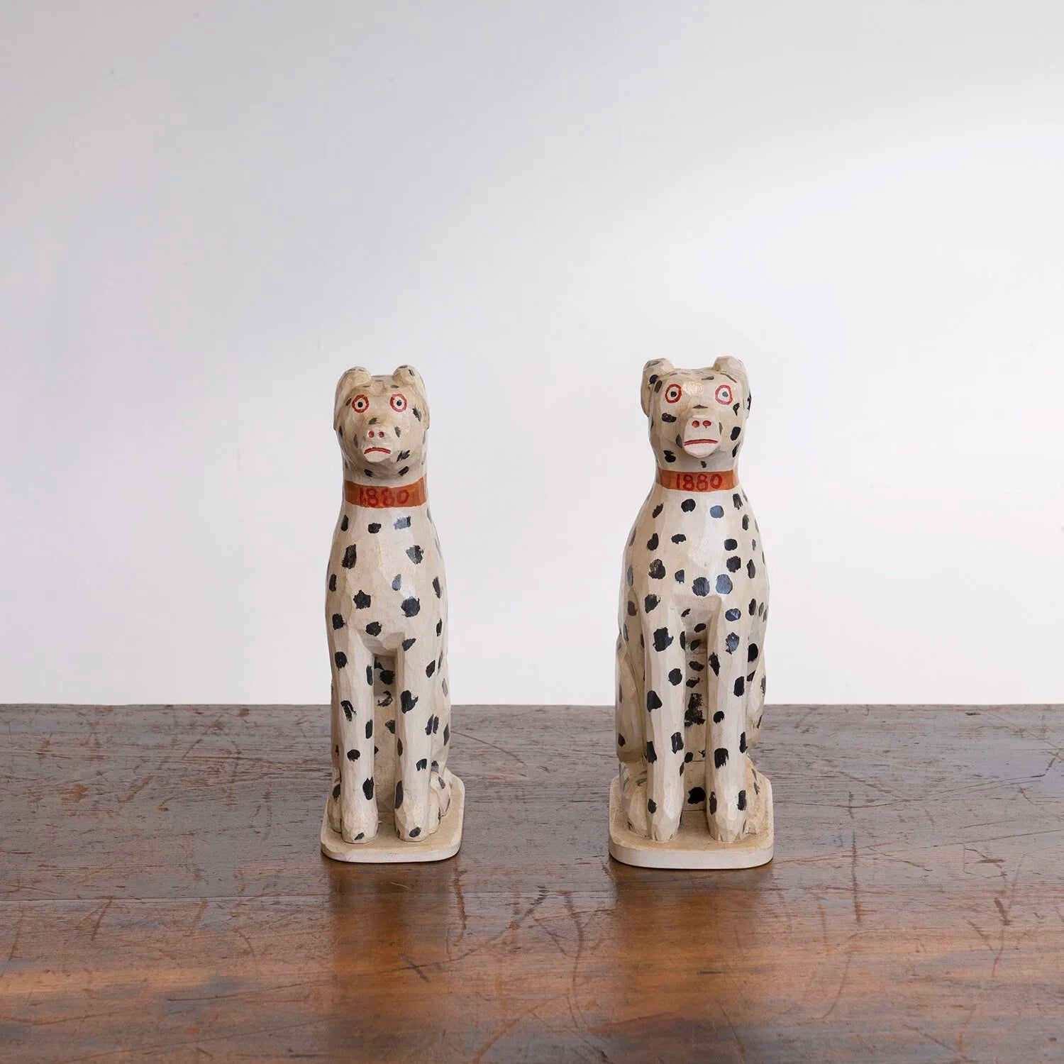 PAIR OF DOG FIGURINES BY JONATHAN BASTIAN