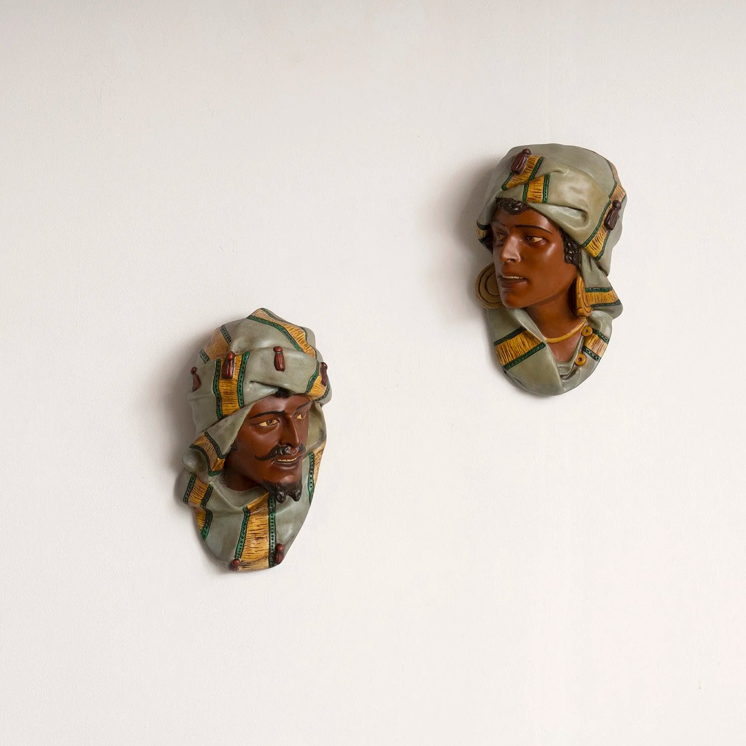 PAIR OF PAINTED PLASTER HEADS - B