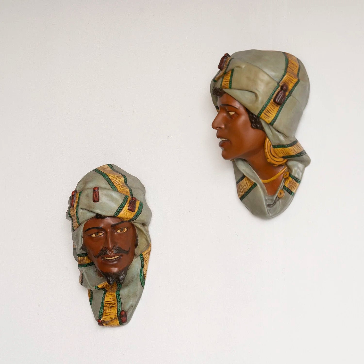 PAIR OF PAINTED PLASTER HEADS - B