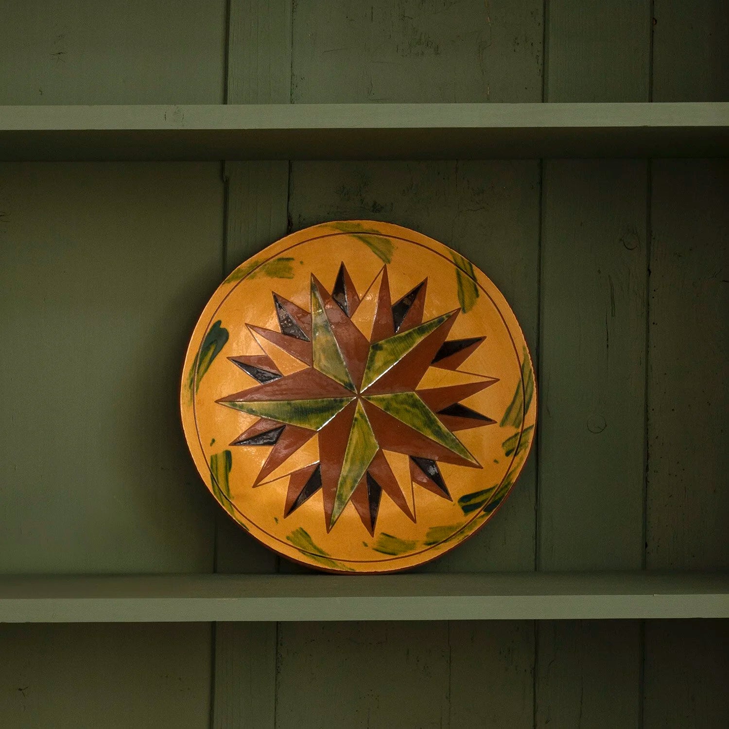 REDWARE PLATE WITH 20 POINT STAR