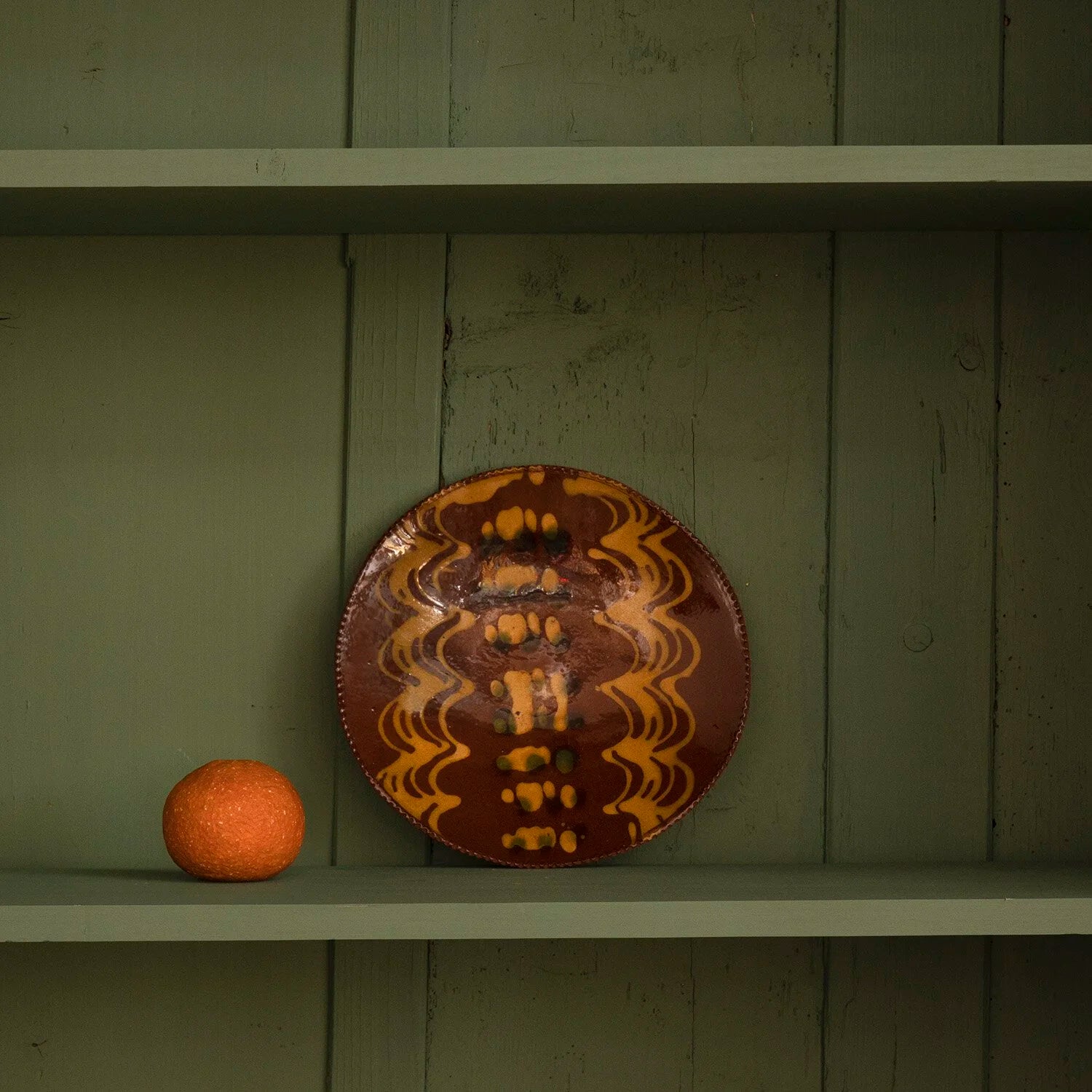 REDWARE PLATE WITH ZIG ZAG PATTERN