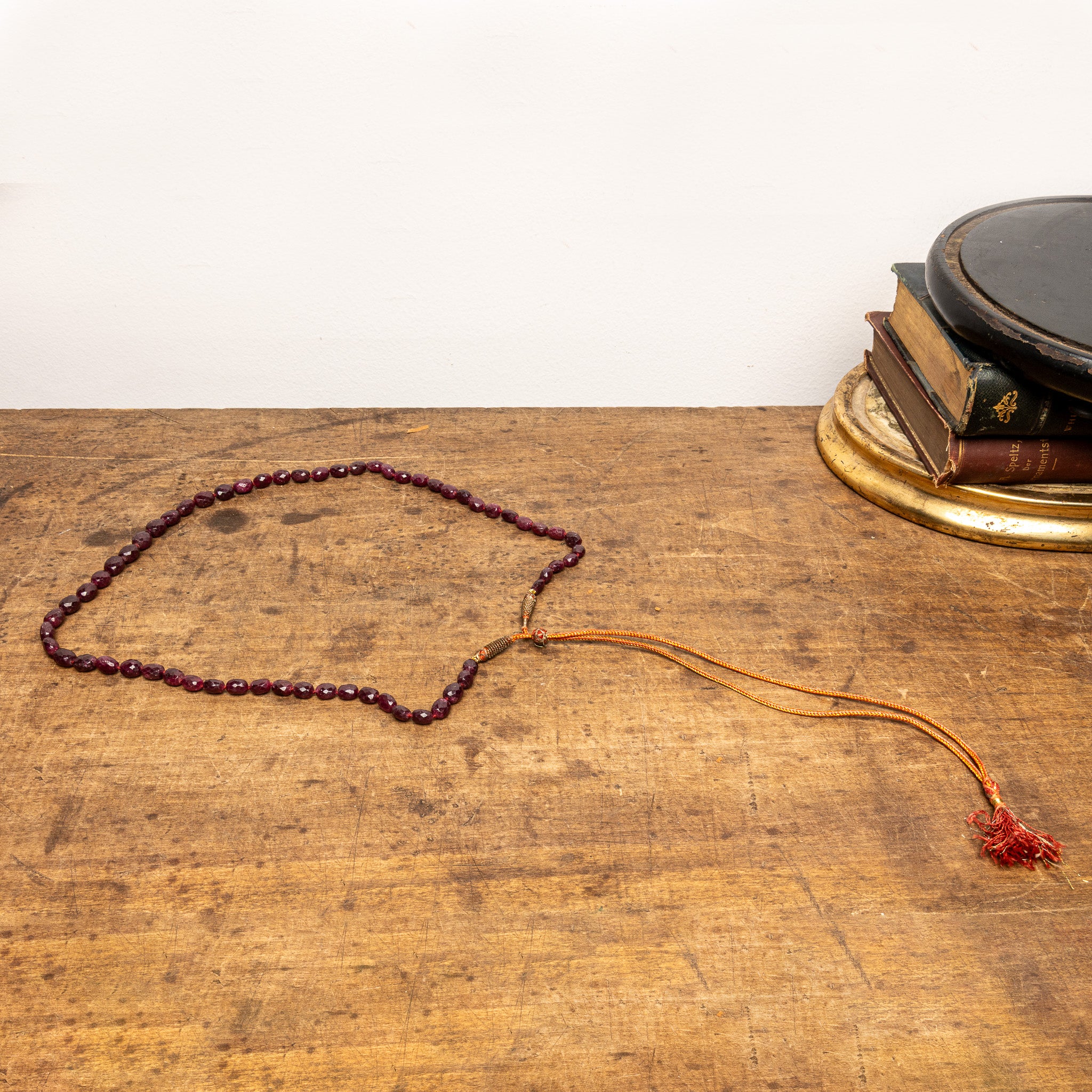 19TH-CENTURY INDIAN MUGHAL FACETED RUBY PRAYER BEADS