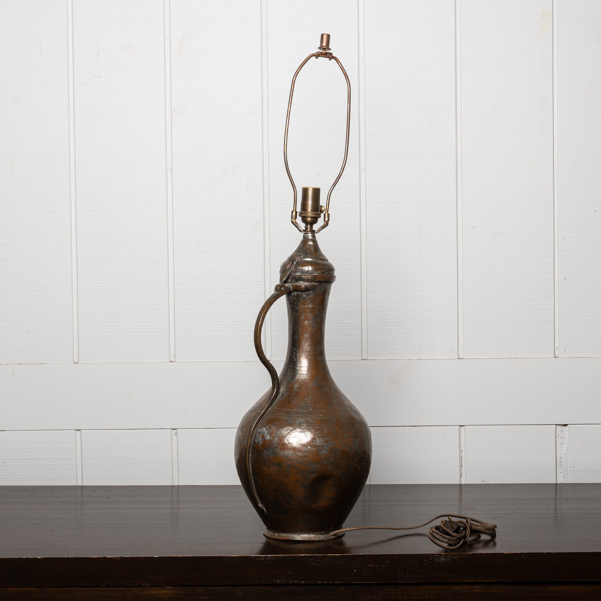 LATE 19TH-CENTURY OTTOMAN COPPER WATER VESSEL MOUNTED AS A TABLE LAMP