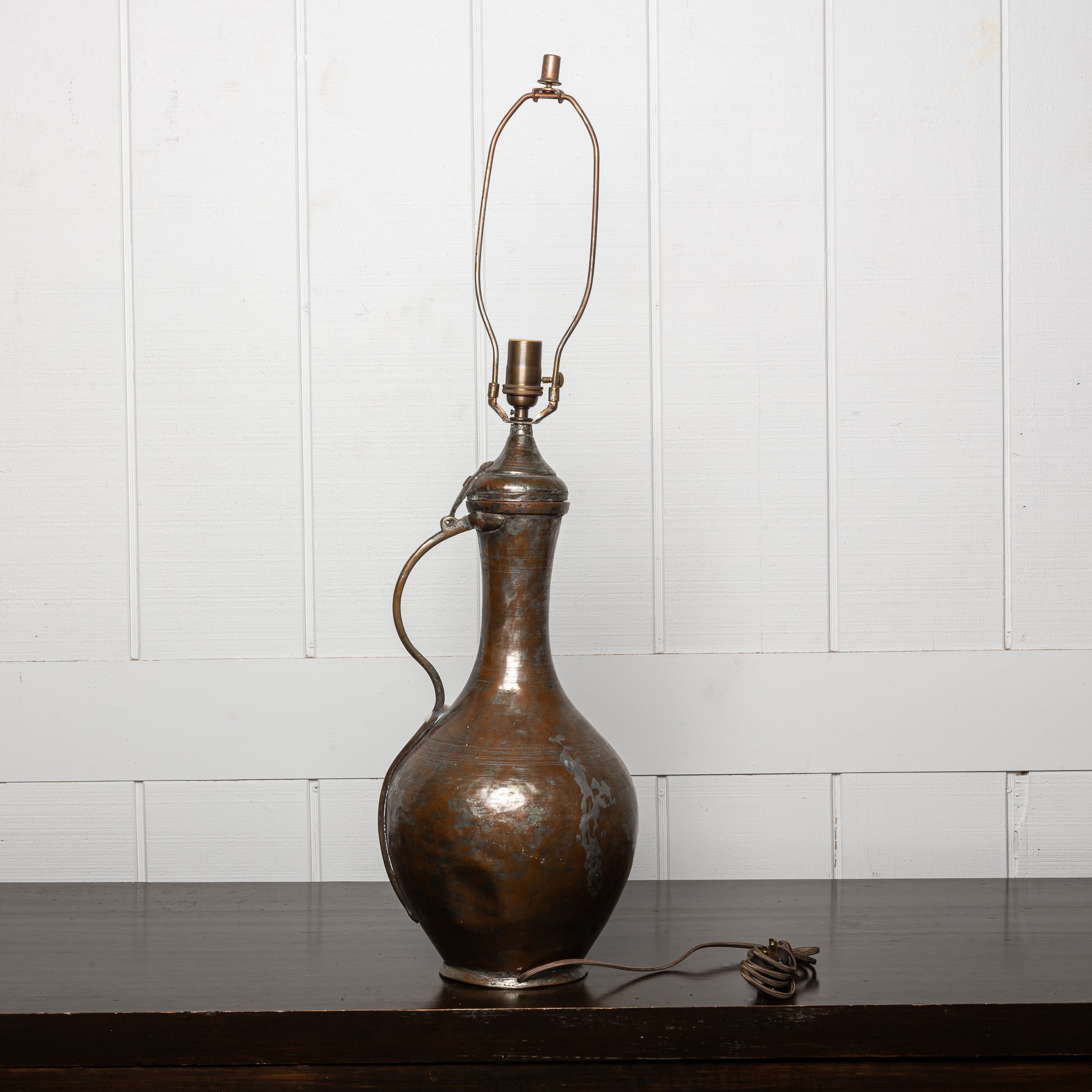 LATE 19TH-CENTURY OTTOMAN COPPER WATER VESSEL MOUNTED AS A TABLE LAMP