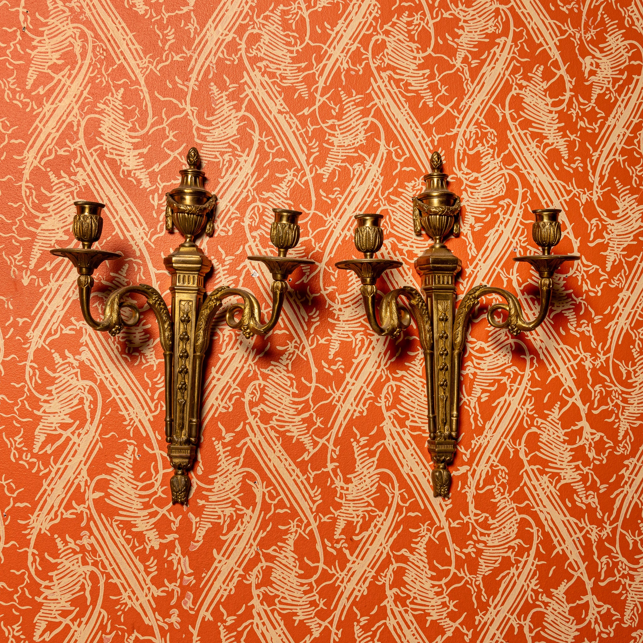 PAIR OF FRENCH LOUIS XVI STYLE CAST BRASS TWO ARM WALL SCONCES