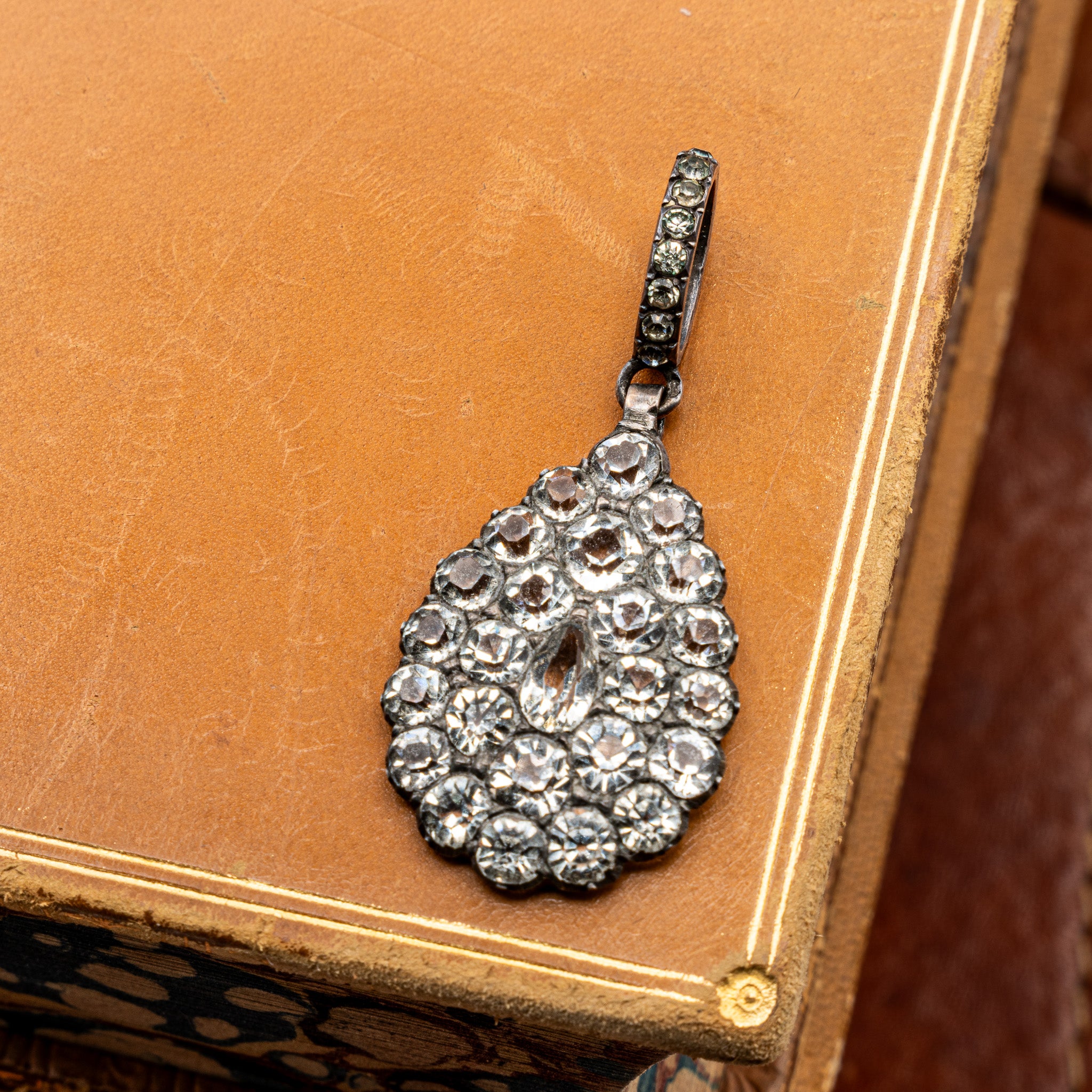 LATE GEORGIAN SILVER AND FOIL-BACKED PASTE PENDANT DROP