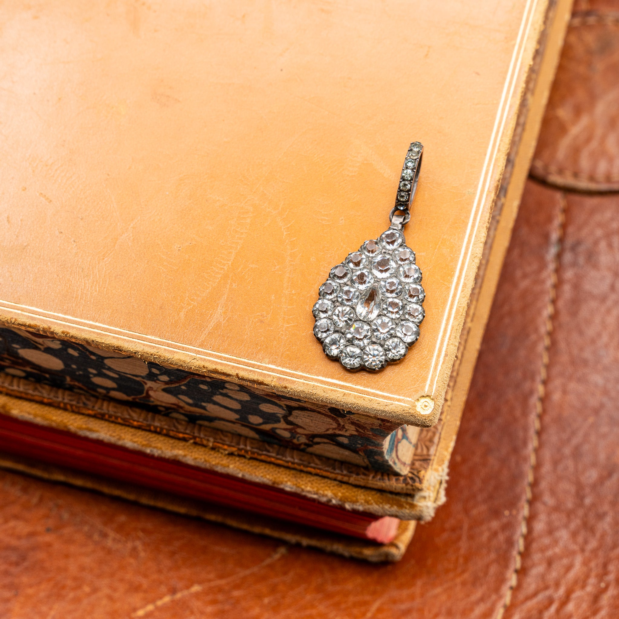 LATE GEORGIAN SILVER AND FOIL-BACKED PASTE PENDANT DROP