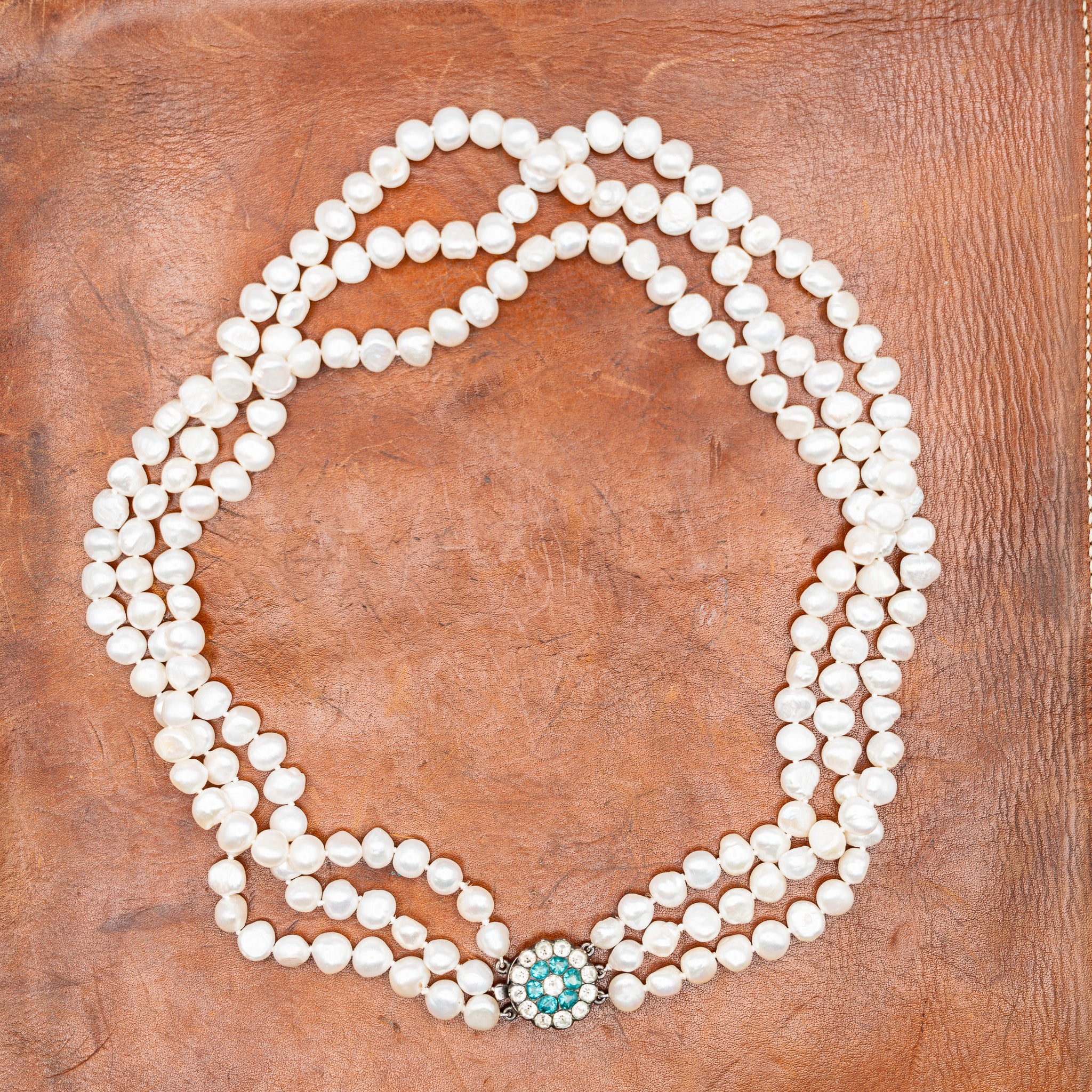 GEORGIAN NATURAL BAROQUE PEARL TRIPLE STRAND NECKLACE WITH PASTE CLASP
