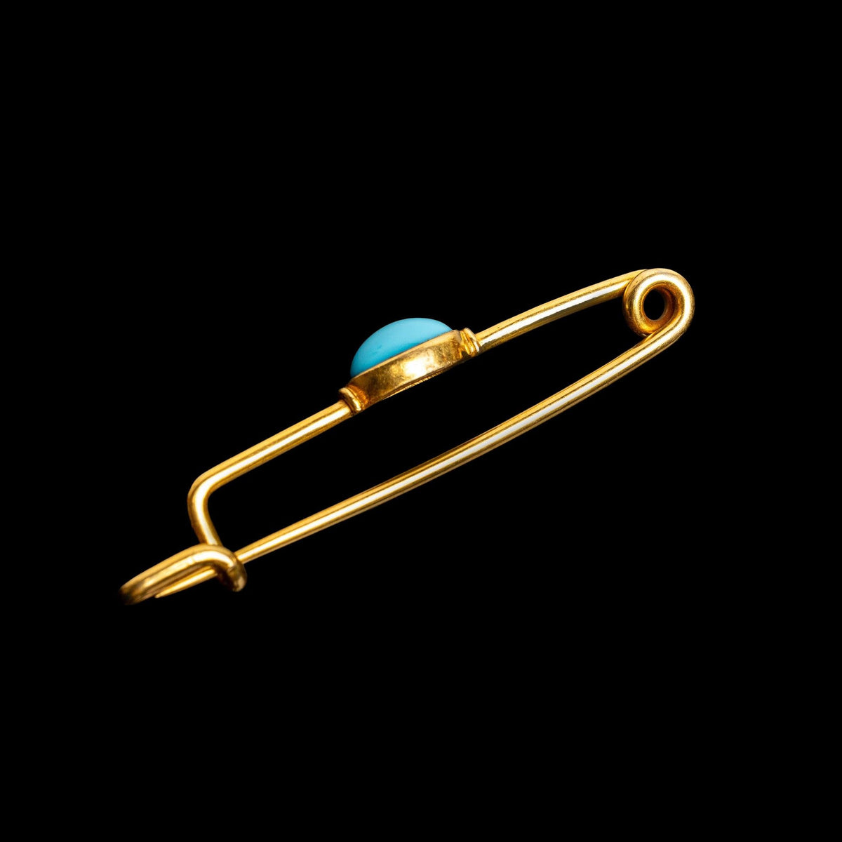 VICTORIAN GOLD SAFETY PIN BROOCH WITH BLUE CABOCHON, detail view