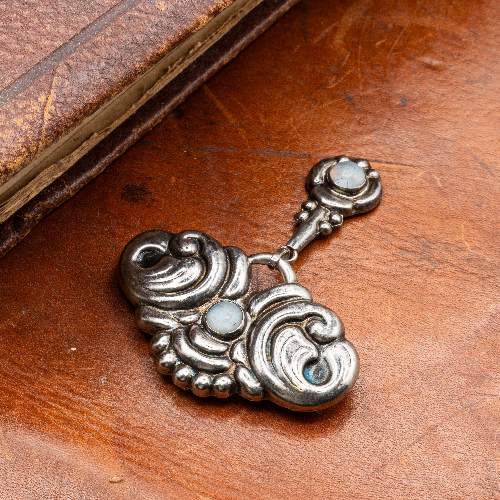 VIENNESE SECESSIONIST SILVER AND MOONSTONE BROOCH
