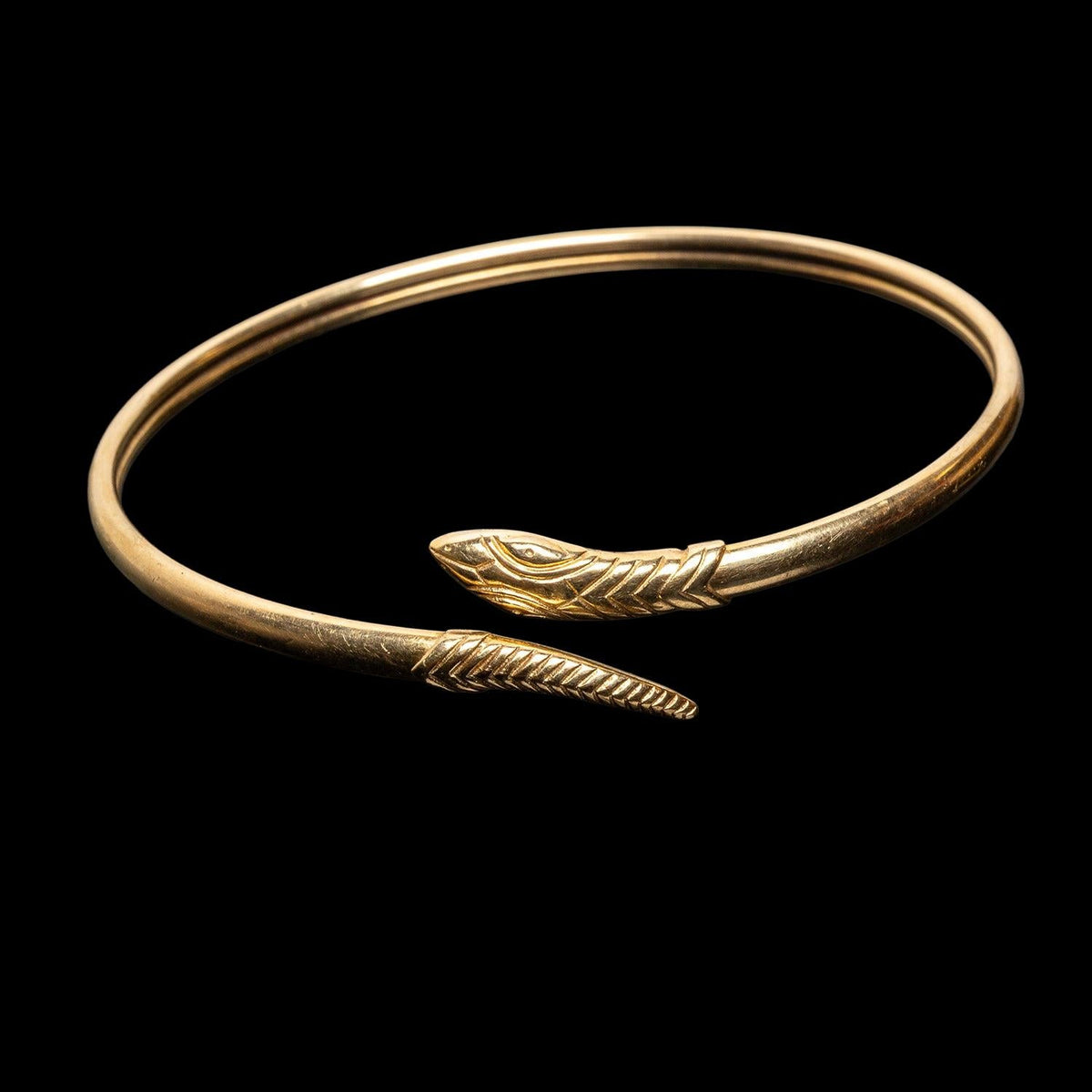 EARLY 20TH CENTURY 9K GOLD SNAKE BANGLE, catalog view