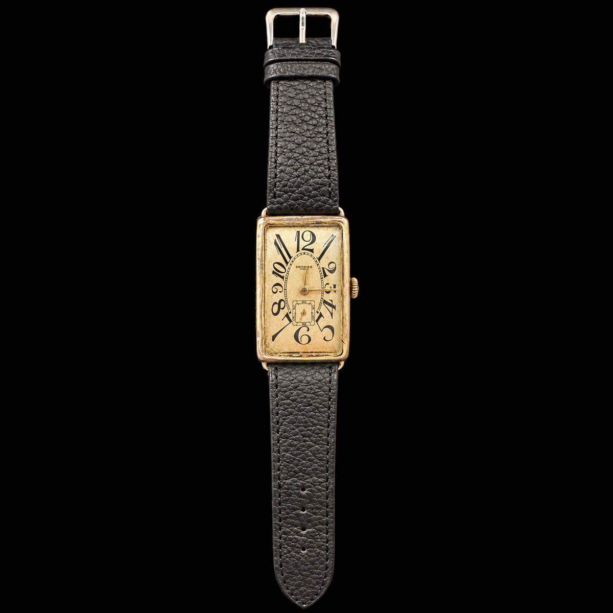 CIRCA 1920 ART DECO WATCH WITH HERMÈS SIGNED DIAL ON BLACK BACKGROUND