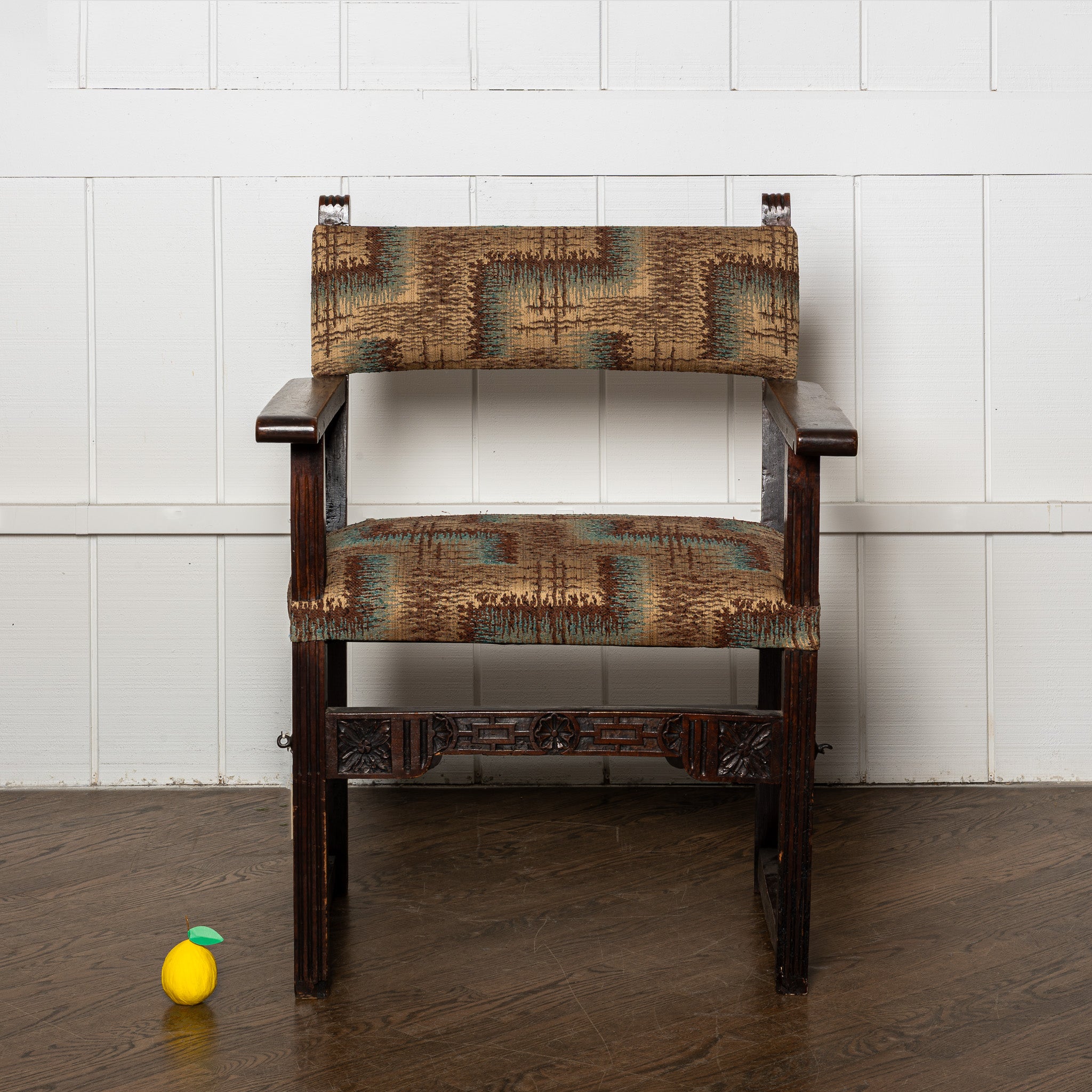 17th / 18th centuty carved European arm chair newly upholstered in antique Art Deco fabric