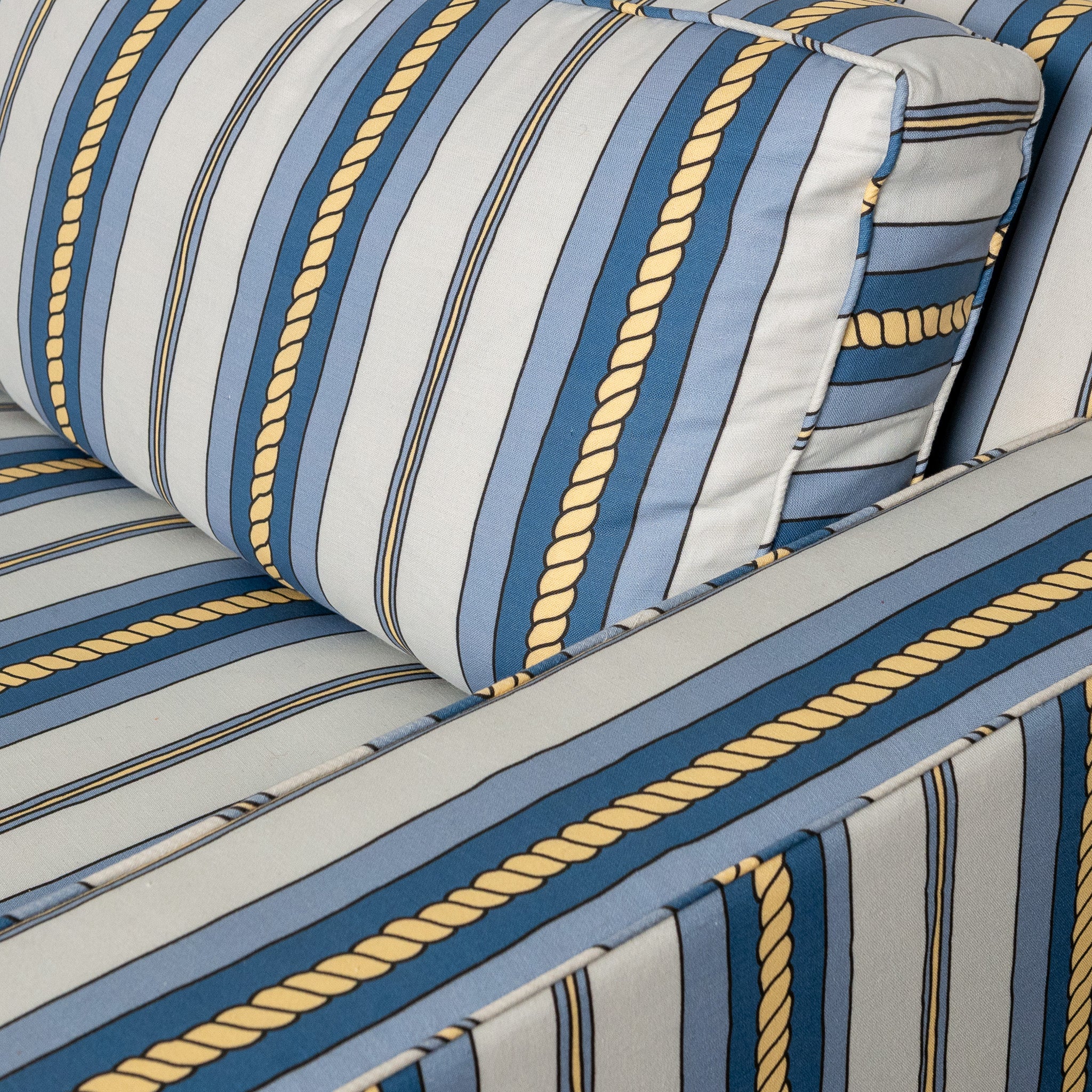 Pair of mid-century American club chairs newly upholstered in DNR Ropes and Strioes fabric