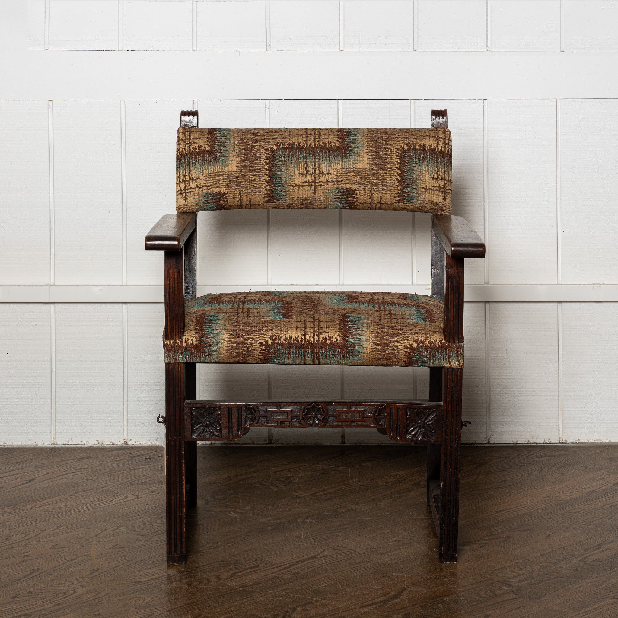 17th / 18th centuty carved European arm chair newly upholstered in antique Art Deco fabric