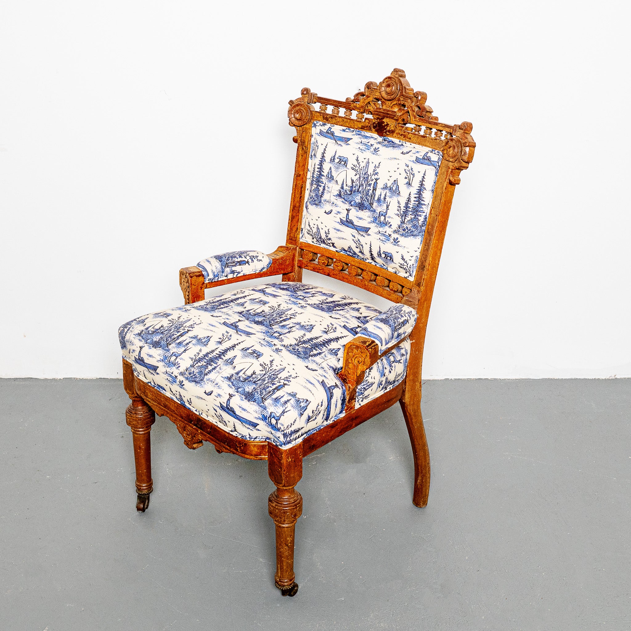 19th century American Eastlake arm chair newly upholsted in LTI Mountian Man fabric