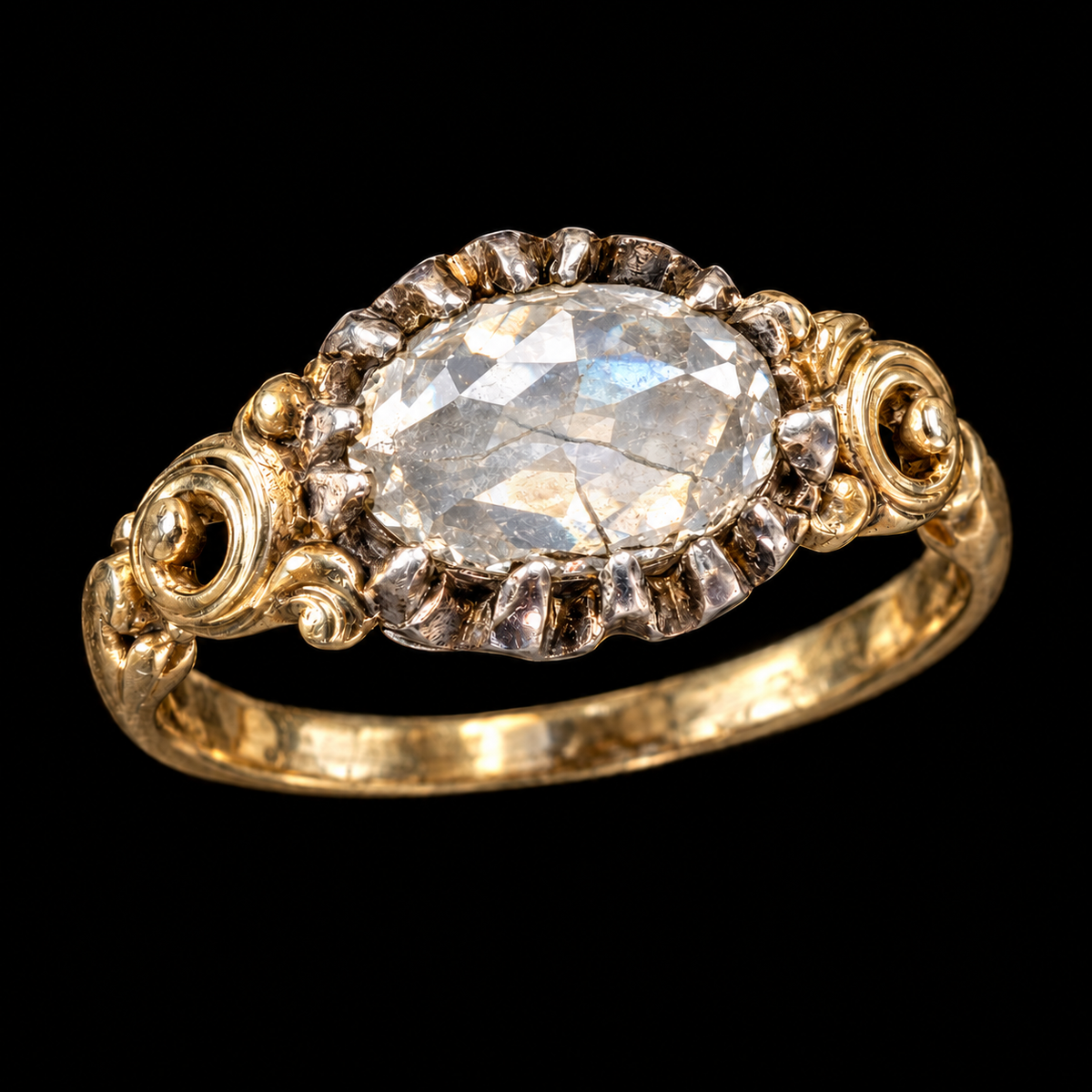 GEORGIAN DIAMOND SOLITAIRE RING WITH SCROLL SHOULDERS ON BLACK BACKGROUND