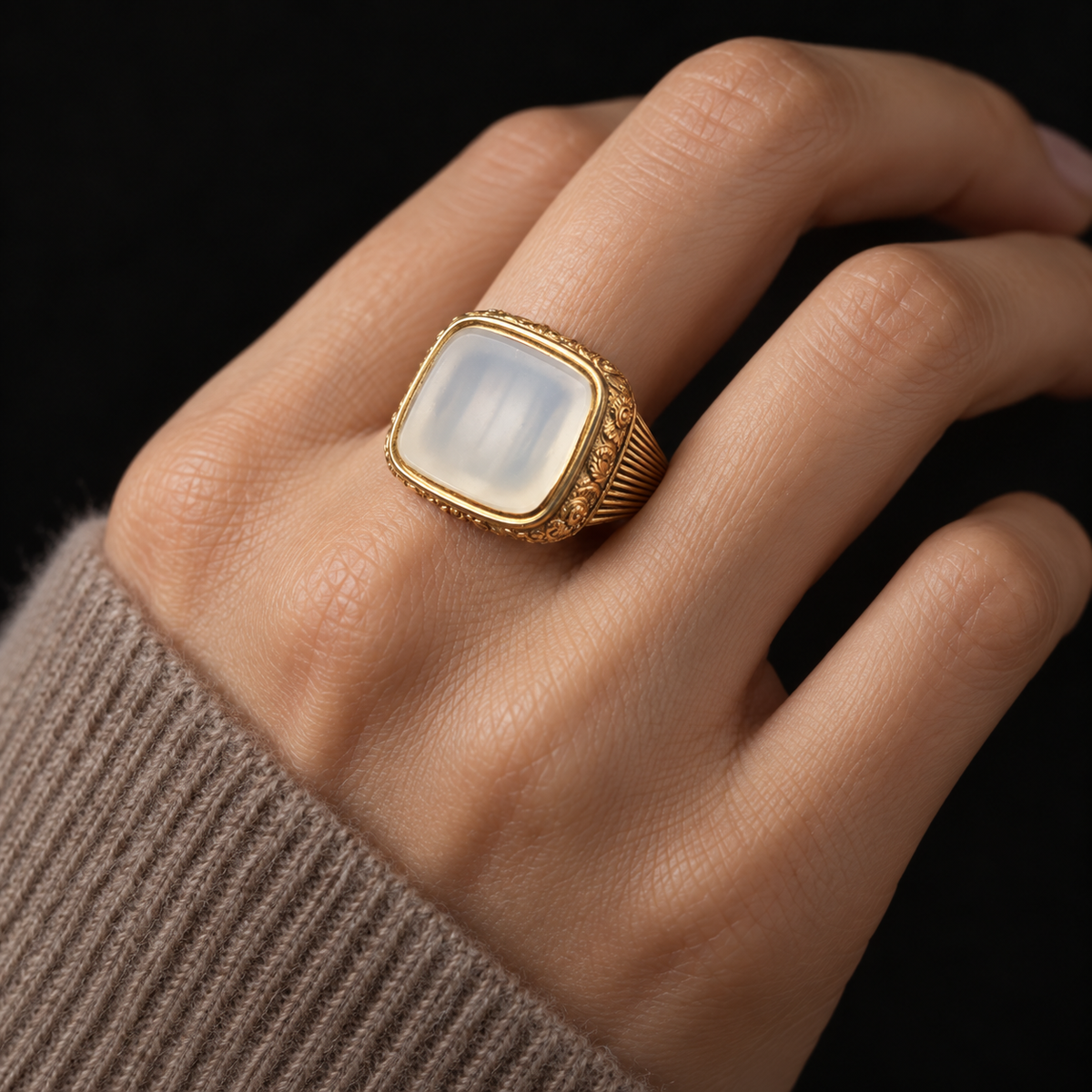 ILLUSTRATIVE MODEL STYLING WITH GEORGIAN PINCHBECK SIGNET RING WITH UNCARVED STONE AND CASHMERE