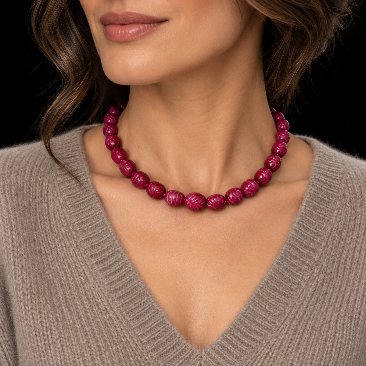 ILLUSTRATIVE MODEL RENDERING: 16-INCH CARVED RUBY COLORED NECKLACE WITH CASHMERE, BLACK BACKGROUND