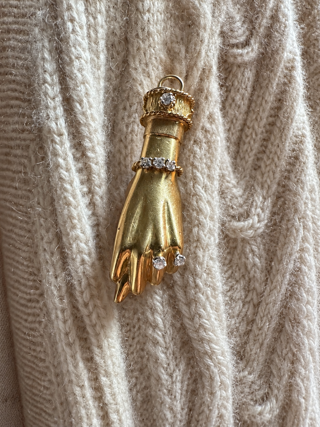 Hand pin on cream cashmere, edited from the original photograph