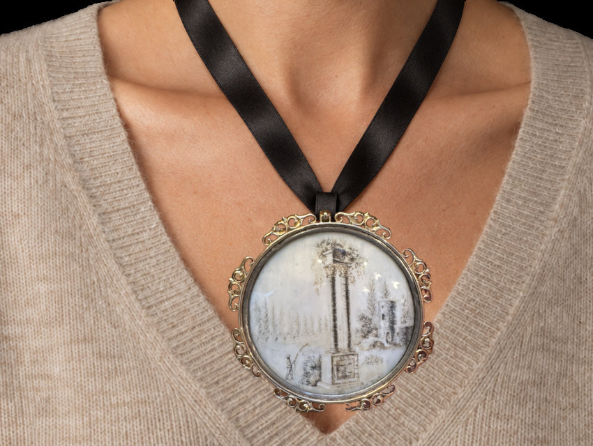 18TH CENTURY FRENCH SEPIA HAIRWORK MEMORIAL PAINTING PENDANT IN SILVER, HORN & 14 KARAT GOLD — worn view