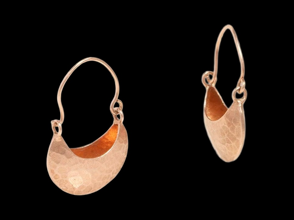 GYPSET HOOP EARRINGS on black background