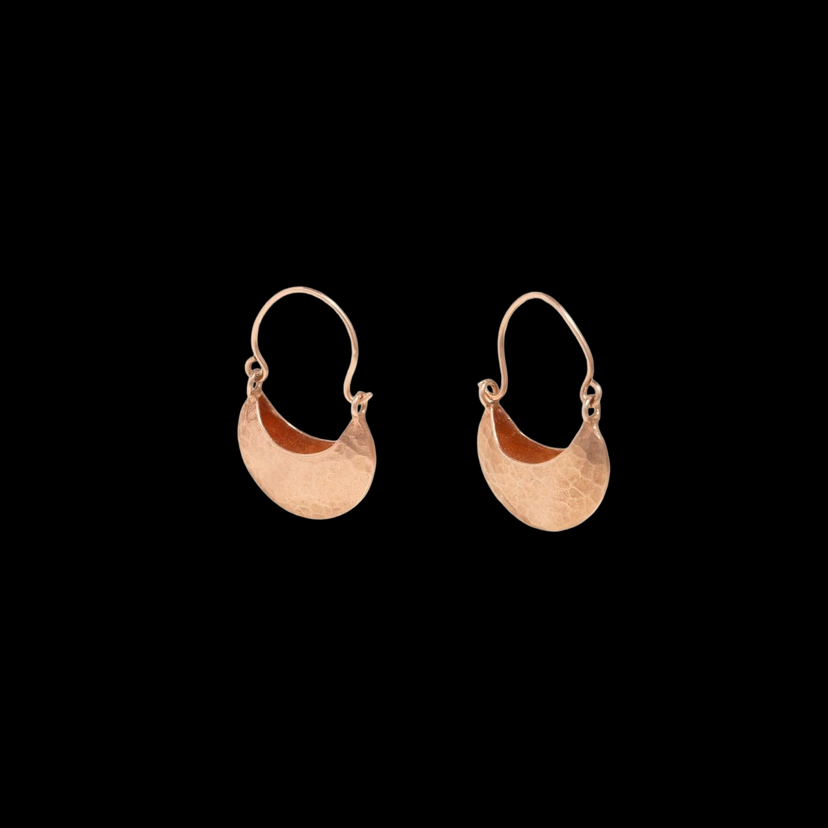 GYPSET HOOP EARRINGS on black background