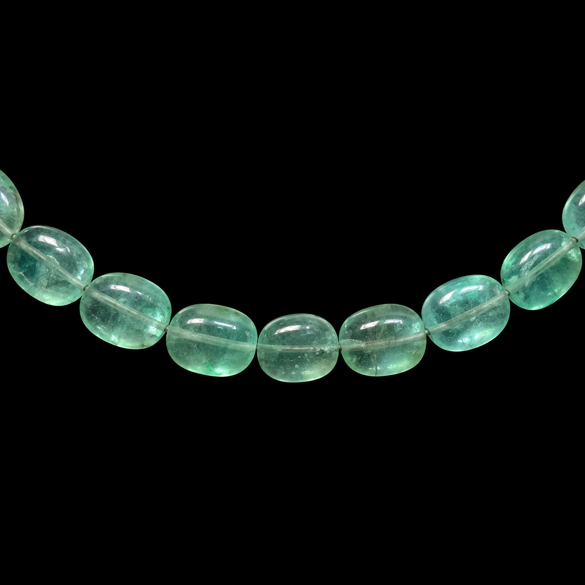 PALE GREEN OVAL BEAD NECKLACE BY SEAN MCNANNEY, FRONT VIEW ON BLACK