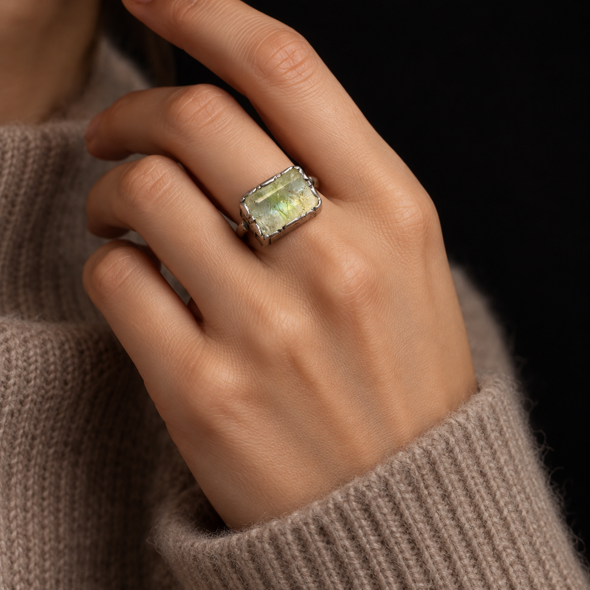 ILLUSTRATIVE MODEL STYLING WITH 17TH CENTURY EMERALD RING IN SILVER AND CASHMERE