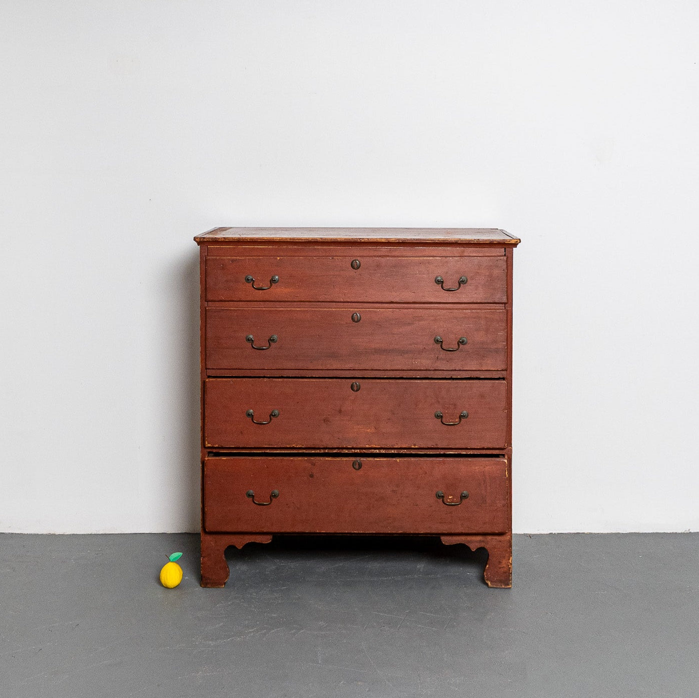 19th century American red painted lift-top chest of drawers