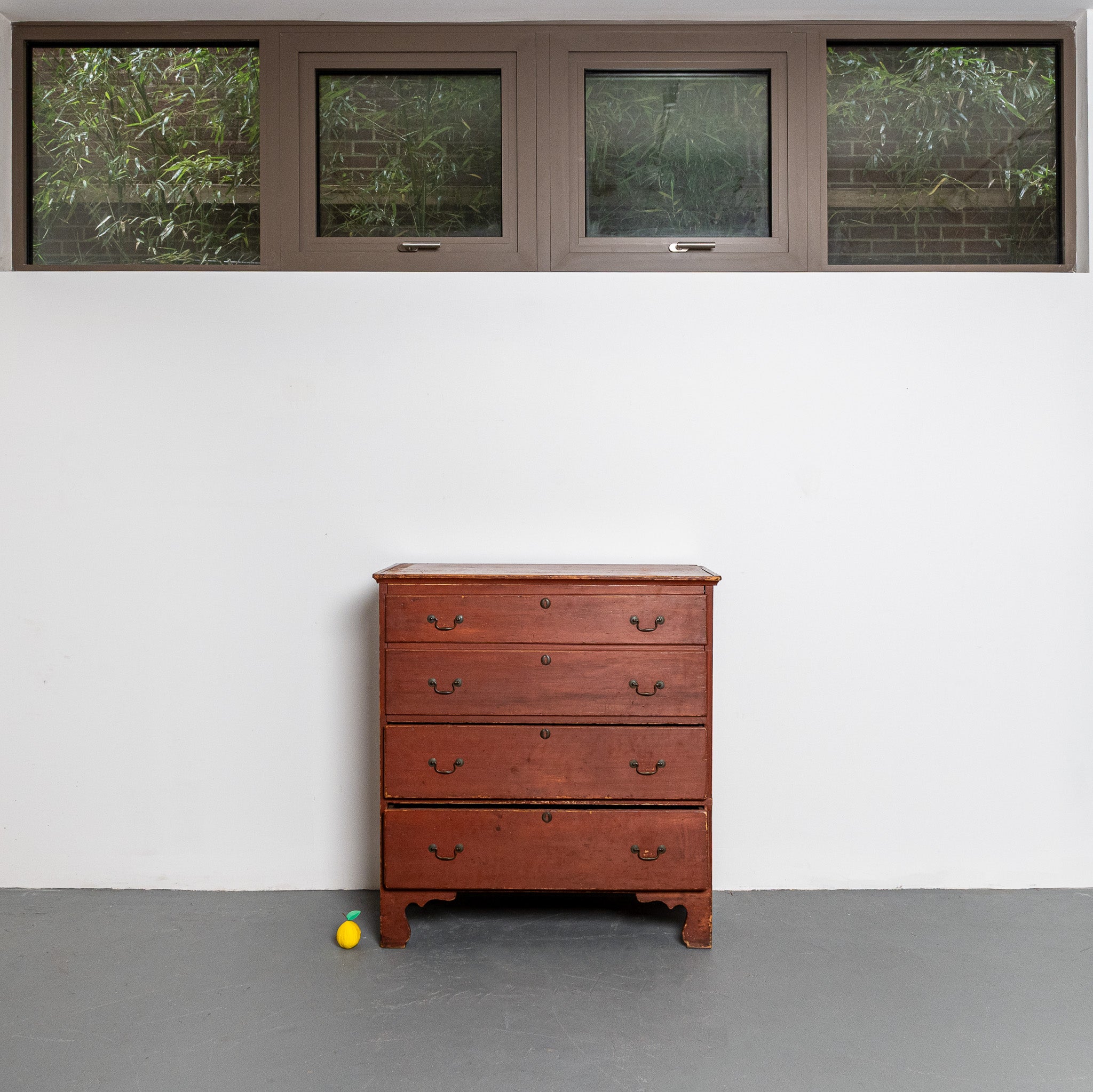 19th century American red painted lift-top chest of drawers
