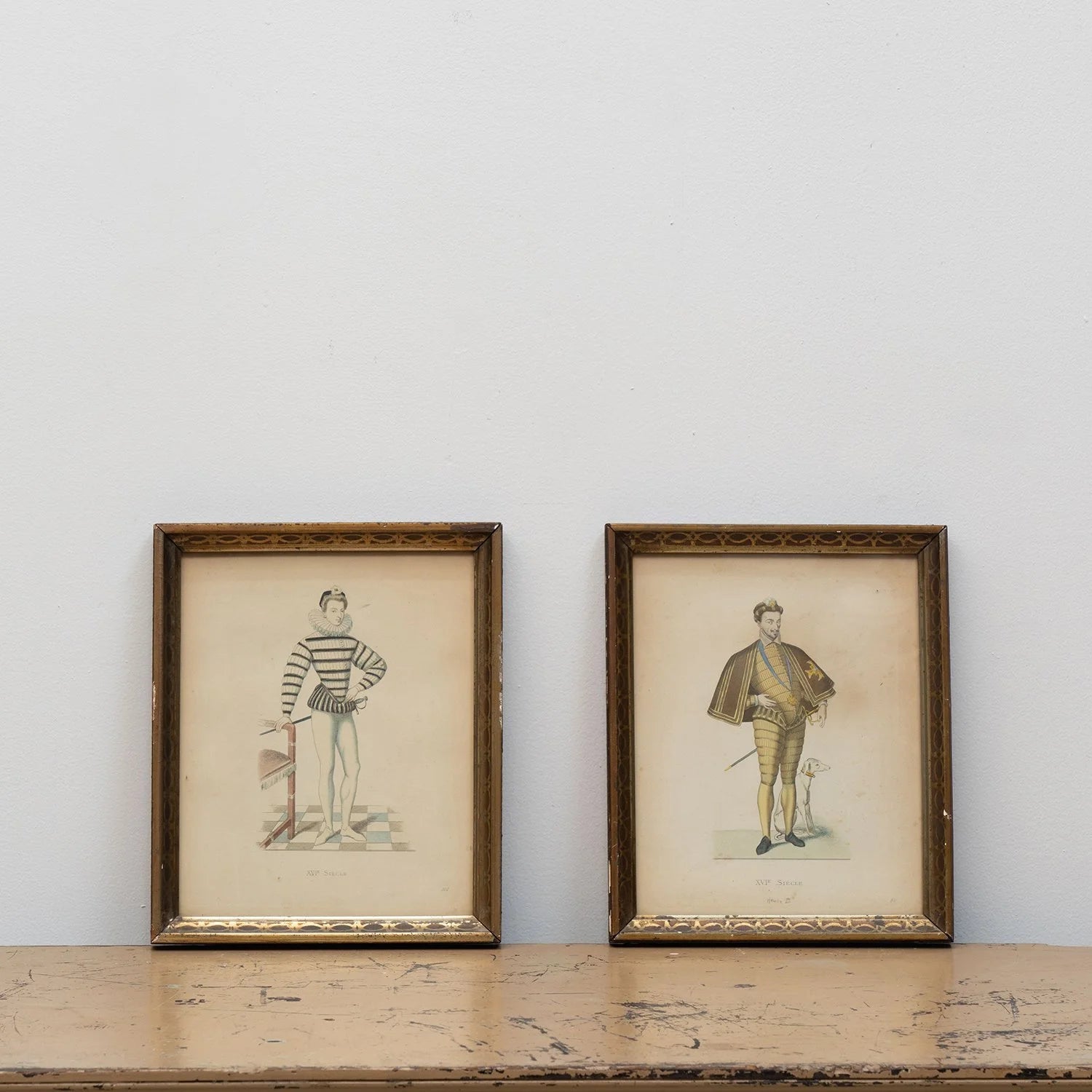PAIR OF HAND COLORED PRINTS OF GENTLEMEN IN PERIOD COSTUME