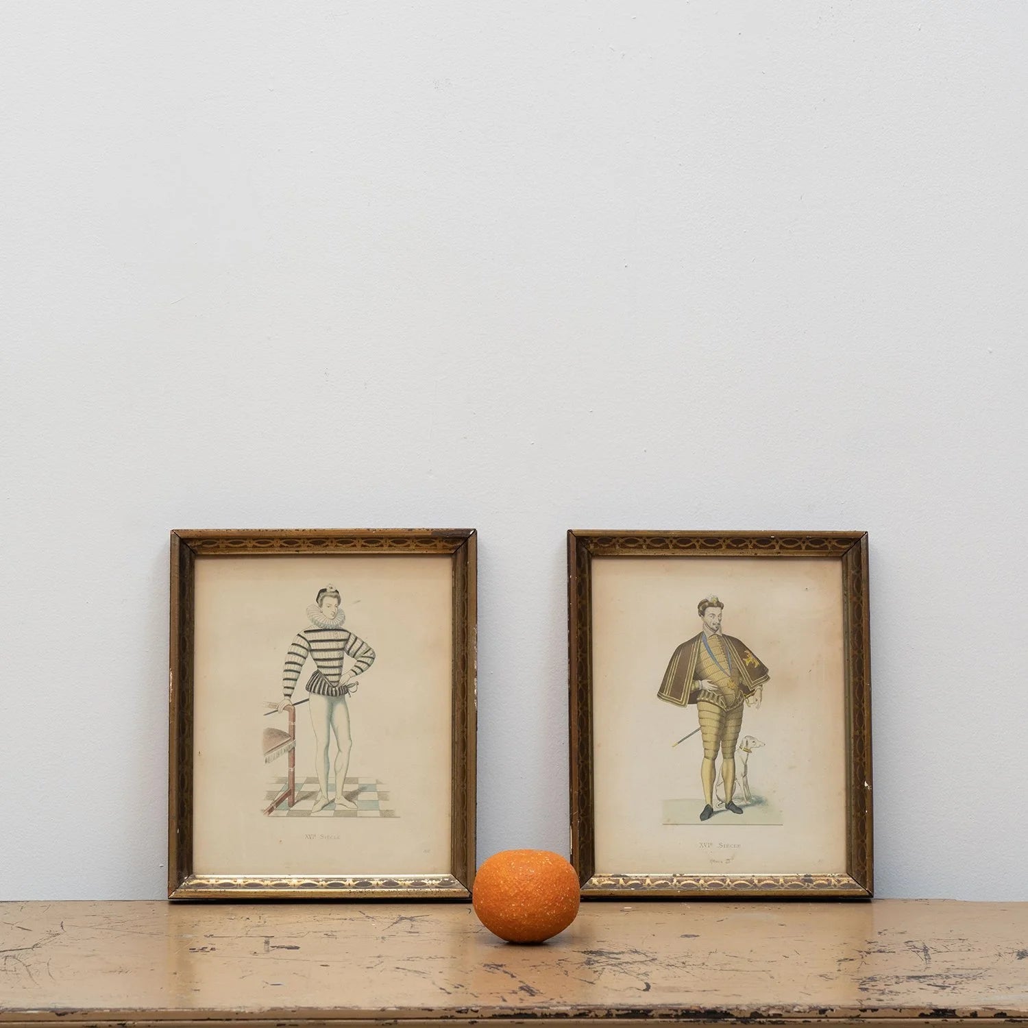 PAIR OF HAND COLORED PRINTS OF GENTLEMEN IN PERIOD COSTUME