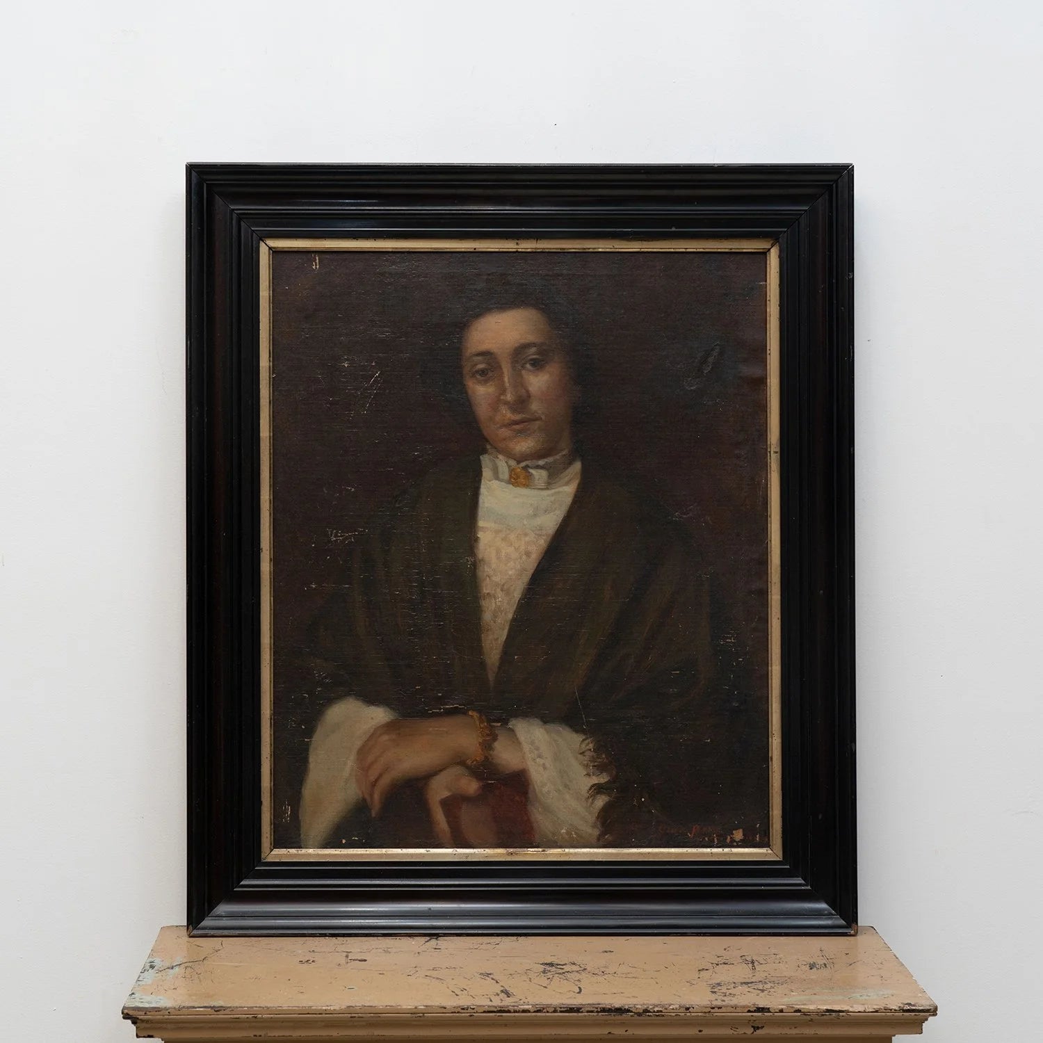 PORTRAIT OF WOMAN IN EBONIZED FRAME