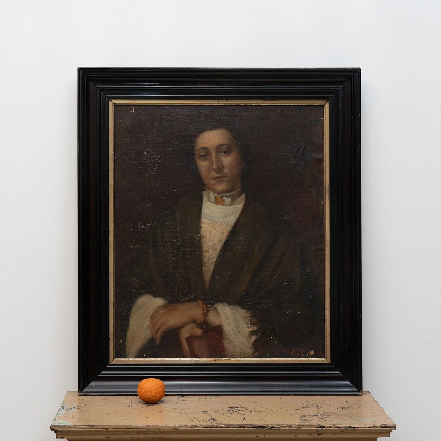 PORTRAIT OF WOMAN IN EBONIZED FRAME