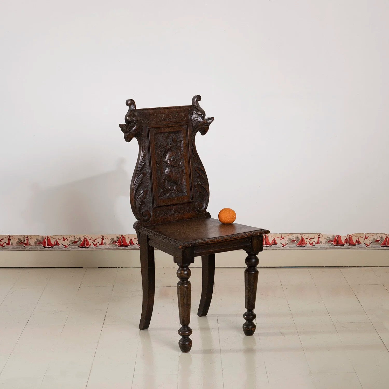 CARVED ENGLISH HALL CHAIR WITH GRIFFONS