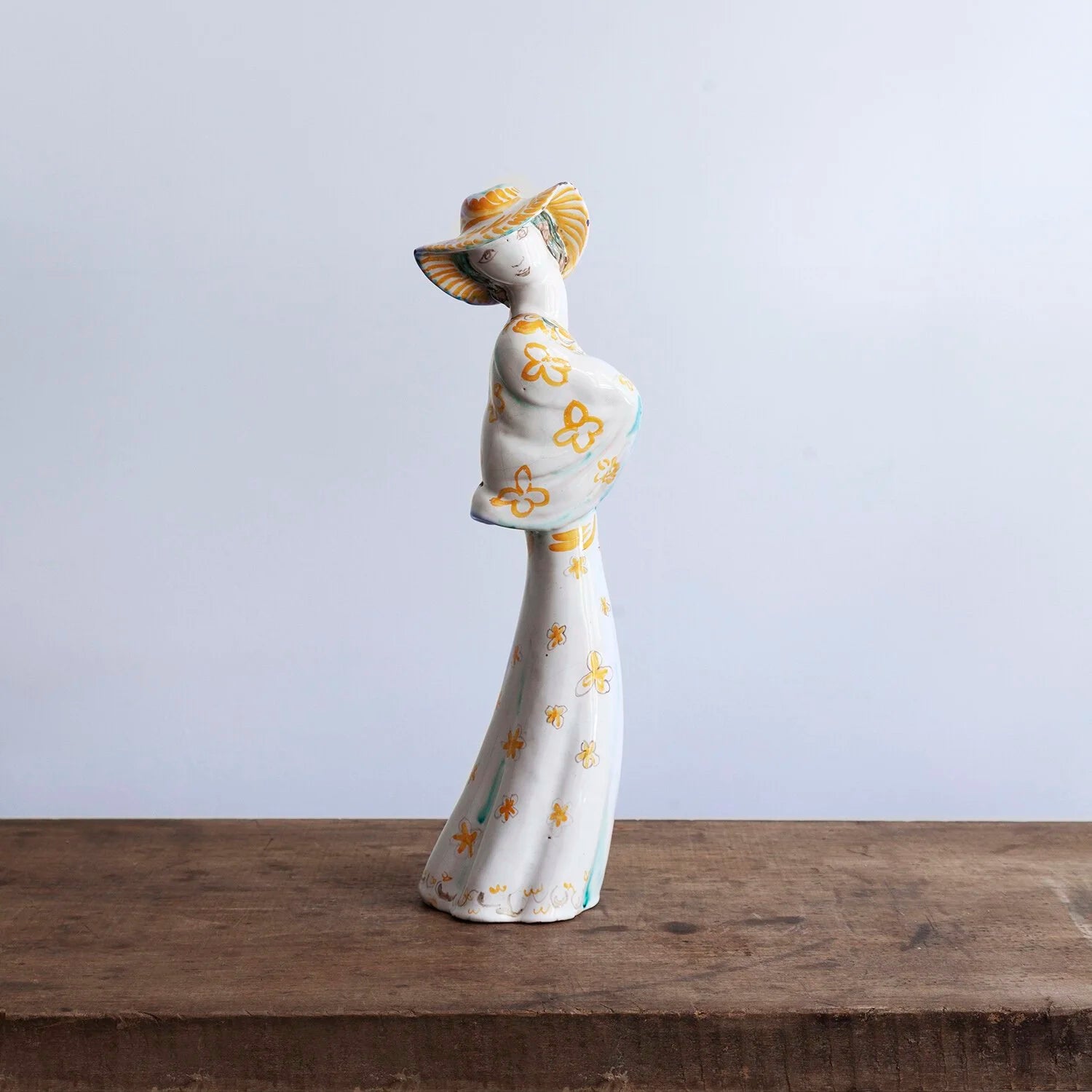 TERRACOTTA FIGURE OF A WOMAN