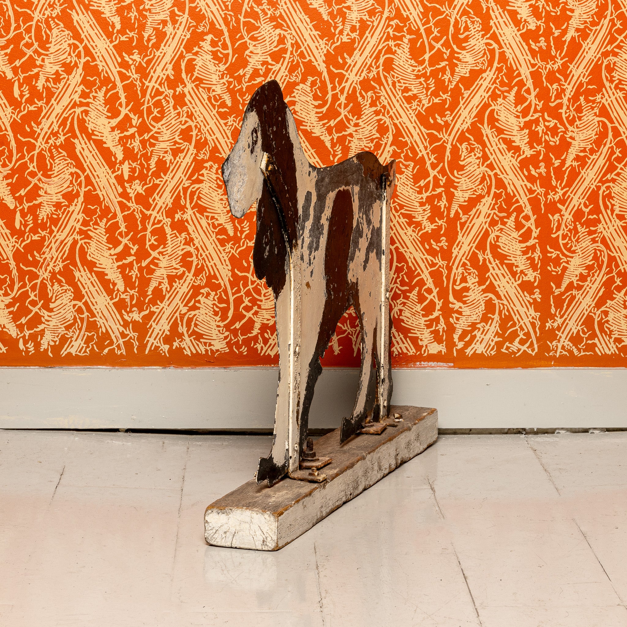 Early 20th century painted metal folk art dog